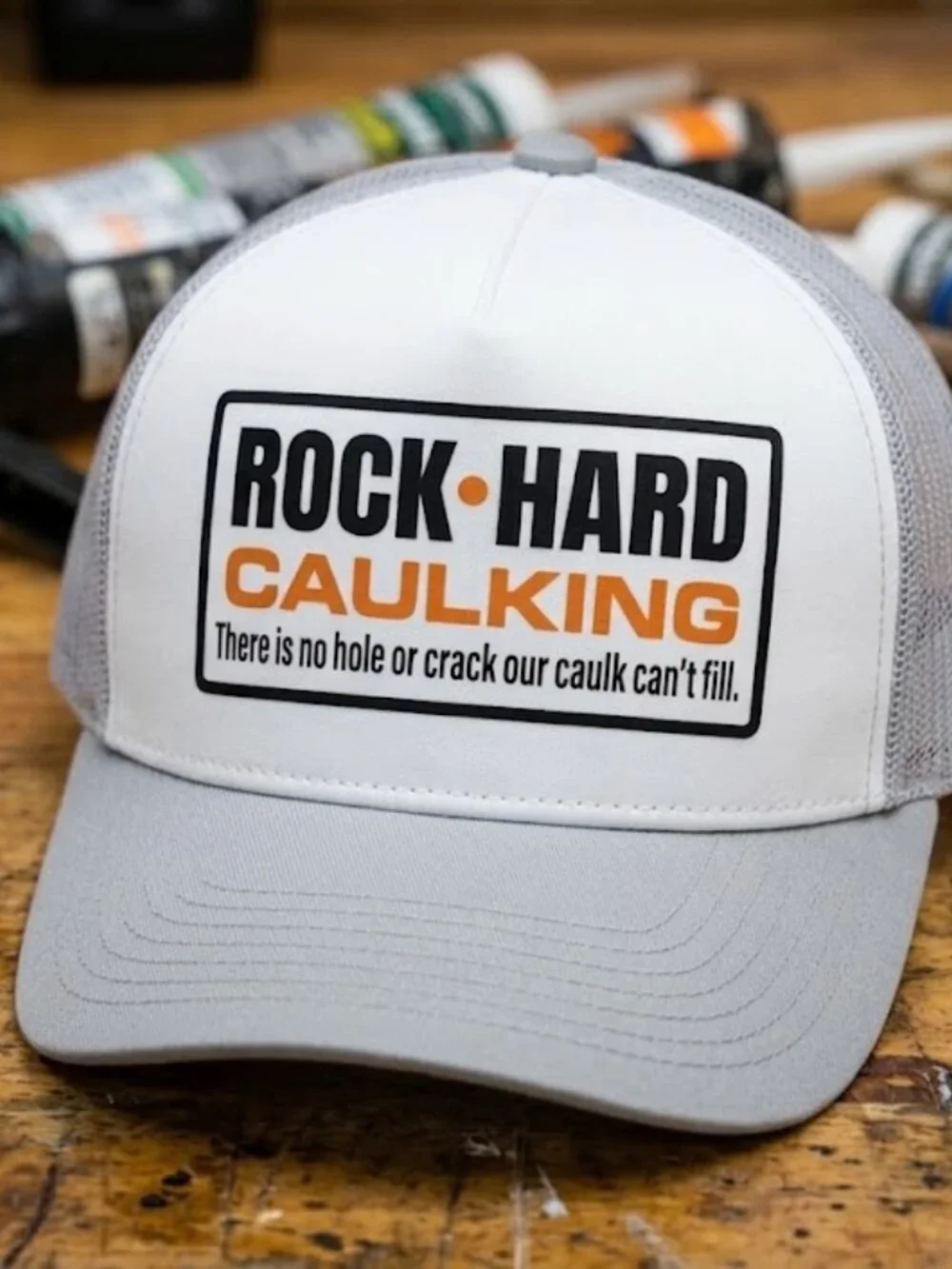Rock Hard Caulking Funny Adult Humor Printed Grey White Foam Trucker Hat Retro